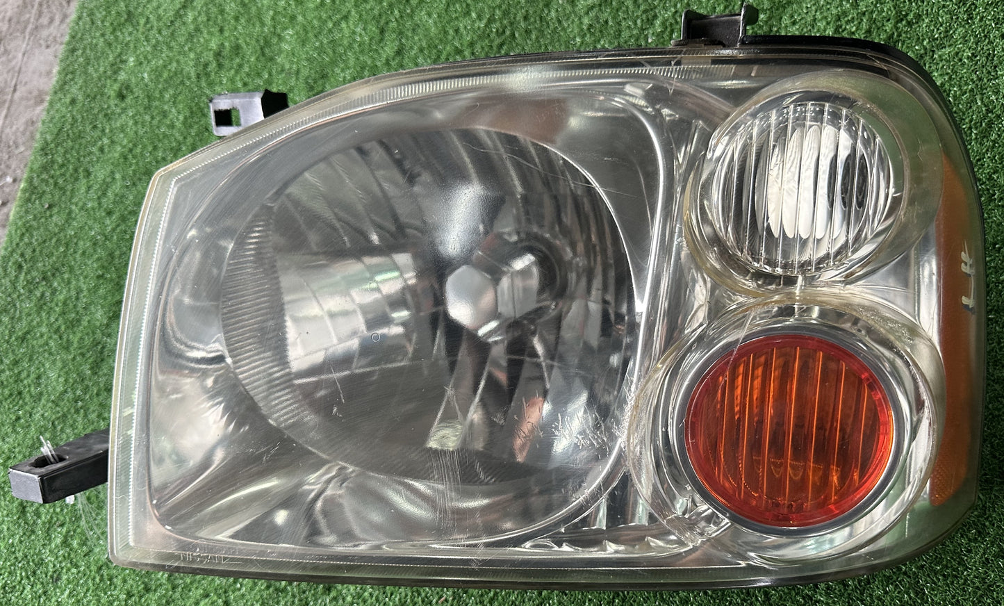 NISSAN FRONTIER HEAD LAMP LH (2607522TV2A)